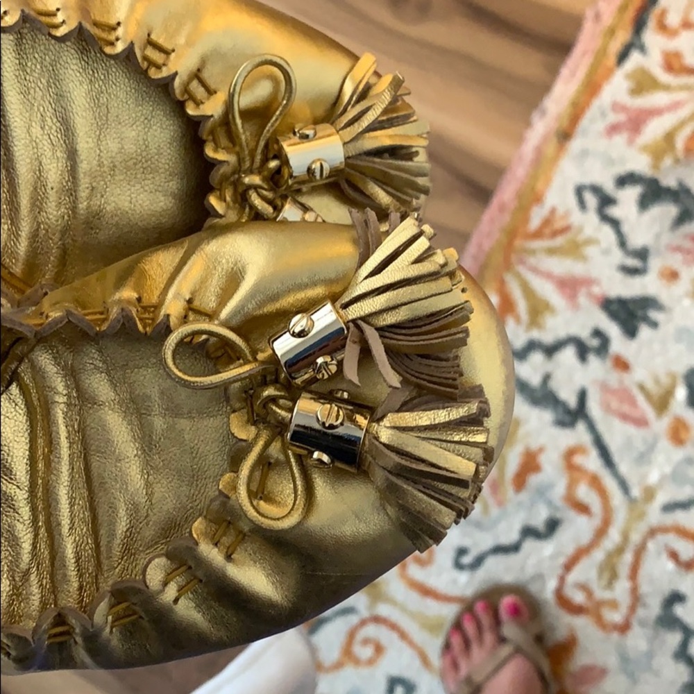 Tory Burch gold tassel flats